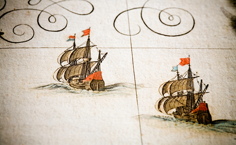 Close up of ships on an illustrated map